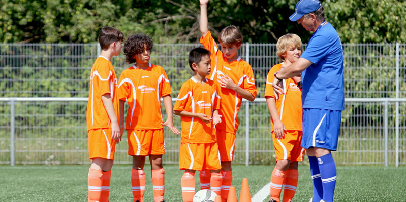 German summer camp with football coaching