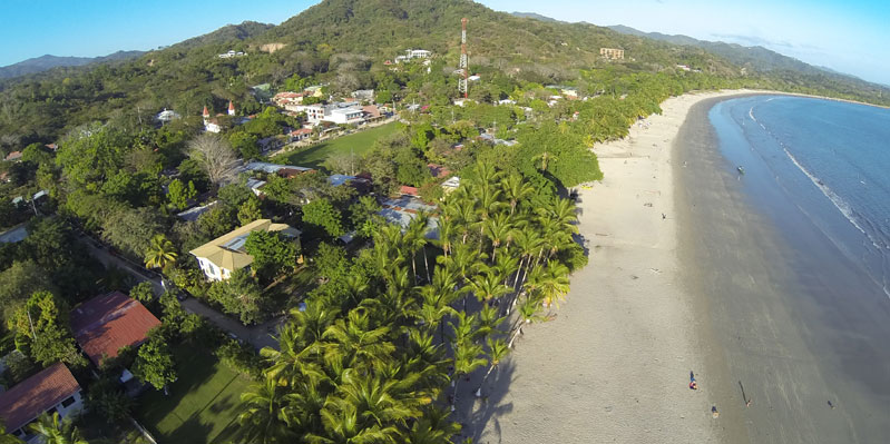 View of the beach and school
